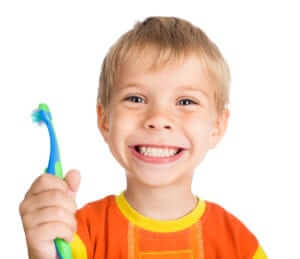 Young boy with a tooth brush