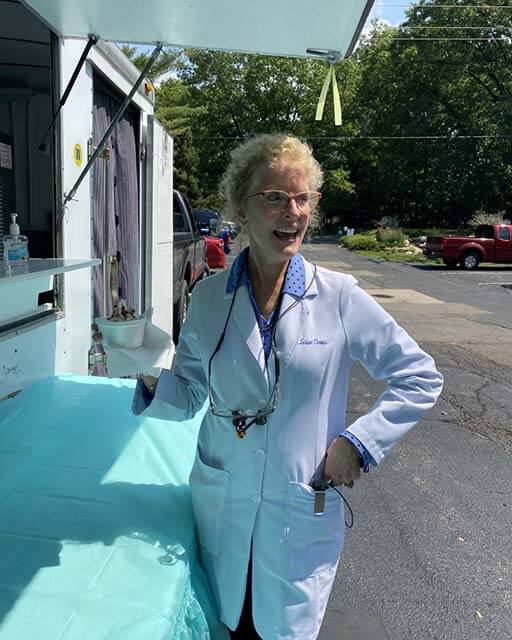 Dr Dennis Enjoying Ice Cream At Her Dentist Office